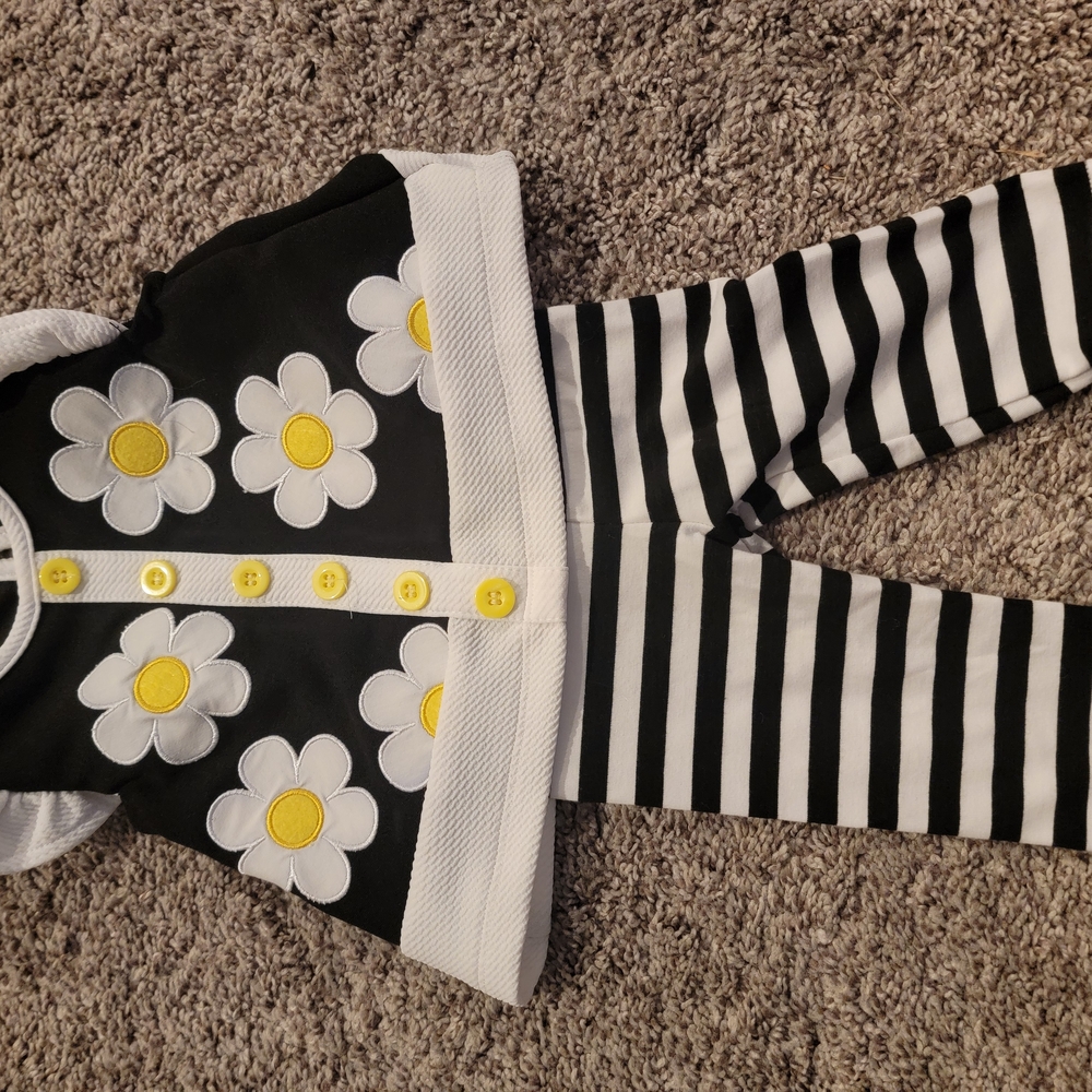 Black and White Striped Outfit with Daisy Accents